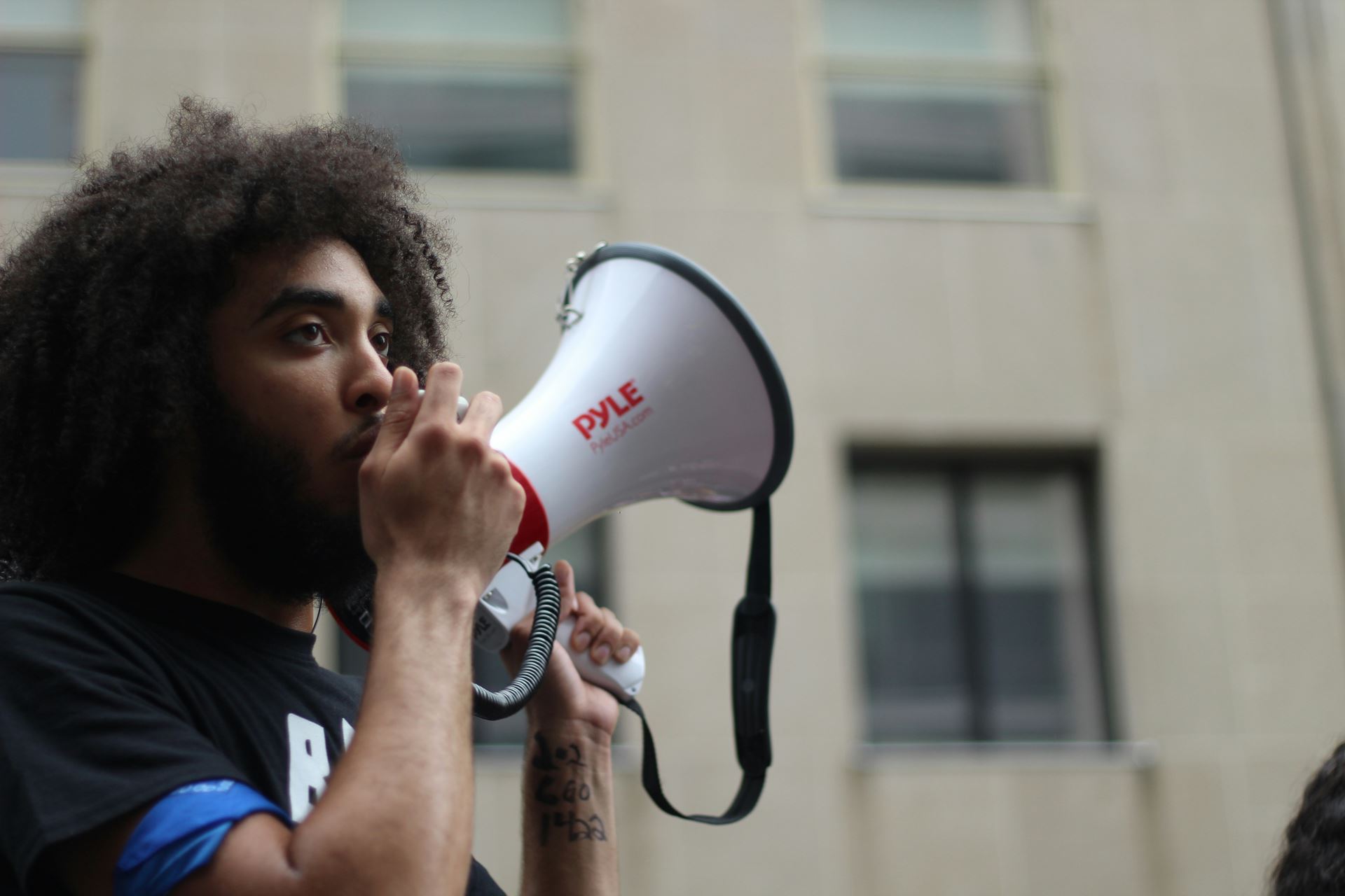 man with a loudhaler